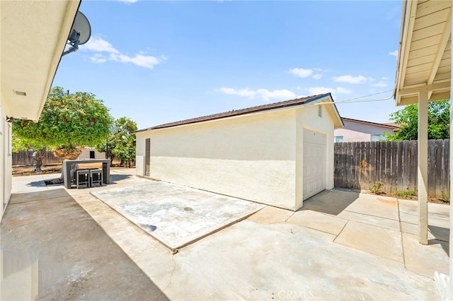 8252 Graves Ave, Rosemead, CA 91770 - view of patio with an outdoor structure and a garage