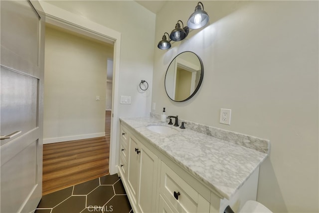 25904 Bear Valley Rd, Tehachapi, CA 93561 - bathroom featuring vanity and tile patterned flooring
