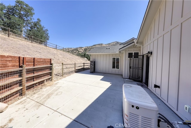25904 Bear Valley Rd, Tehachapi, CA 93561 - fenced backyard with a patio area and a mountain view
