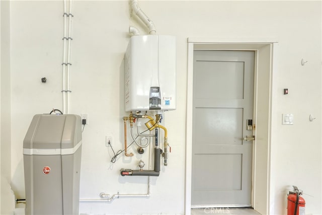 25904 Bear Valley Rd, Tehachapi, CA 93561 - utility room with tankless water heater