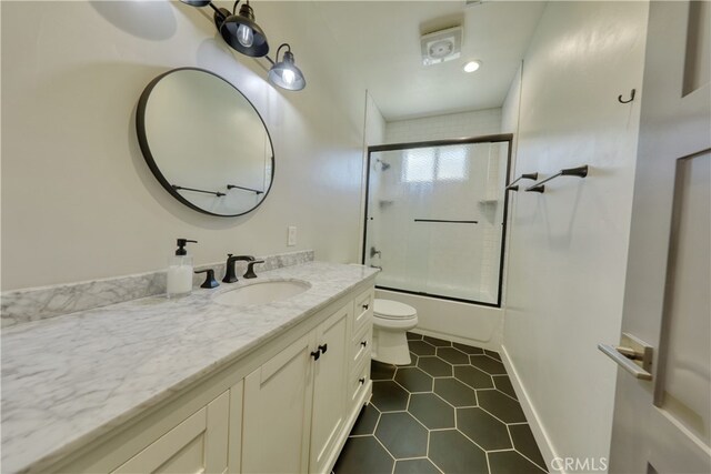 25904 Bear Valley Rd, Tehachapi, CA 93561 - bathroom with vanity, shower / bath combination with glass door, tile patterned floors, and recessed lighting