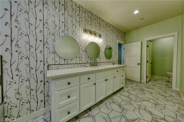 25904 Bear Valley Rd, Tehachapi, CA 93561 - bathroom with wallpapered walls, vanity, and recessed lighting