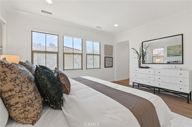 26 Los Indios, Irvine, CA 92618 - bedroom with crown molding, multiple windows, wood finished floors, and recessed lighting