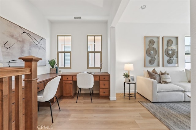 26 Los Indios, Irvine, CA 92618 - office with light wood-style flooring and built in study area