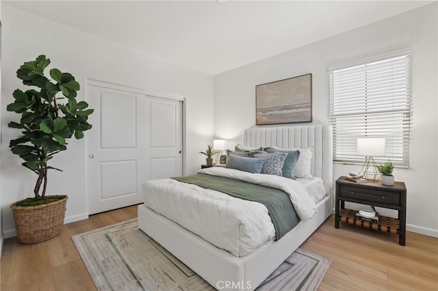 26 Los Indios, Irvine, CA 92618 - bedroom with light wood-style floors and a closet