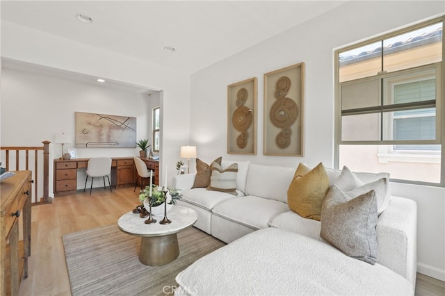 26 Los Indios, Irvine, CA 92618 - living room with healthy amount of natural light, light wood finished floors, and a desk