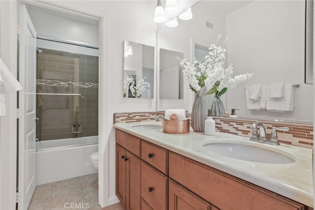 26 Los Indios, Irvine, CA 92618 - full bathroom with tasteful backsplash, double vanity, and bath / shower combo with glass door