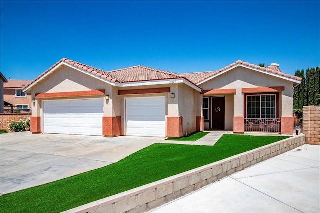 39423 Rowan Ct, Palmdale, CA 93551 - view of front of home featuring an attached garage, stucco siding, concrete driveway, a front lawn, and a tiled roof