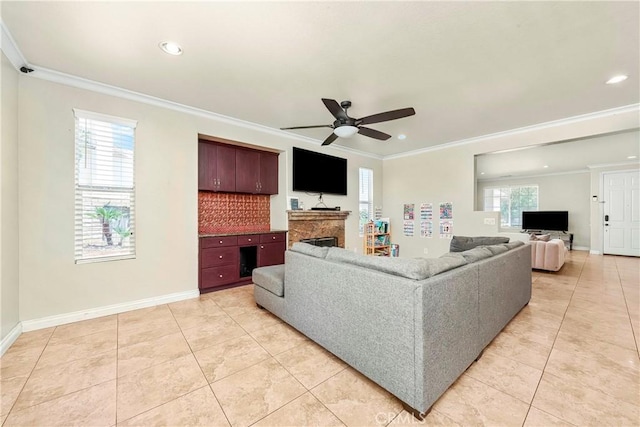 39423 Rowan Ct, Palmdale, CA 93551 - living area featuring crown molding, a ceiling fan, a fireplace, light tile patterned floors, and recessed lighting