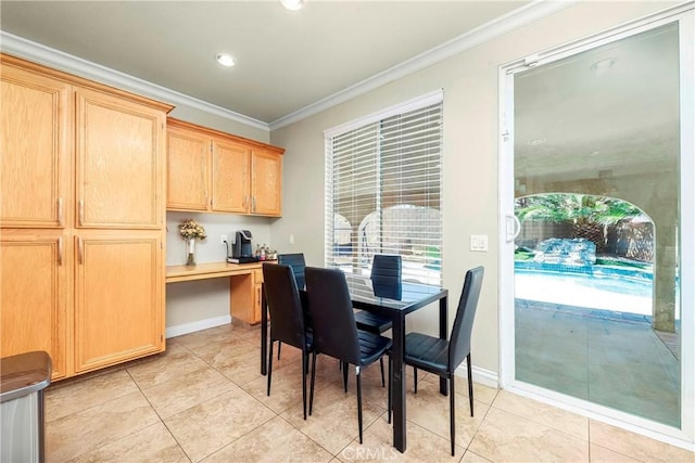 39423 Rowan Ct, Palmdale, CA 93551 - dining area featuring crown molding, light tile patterned flooring, built in desk, and recessed lighting