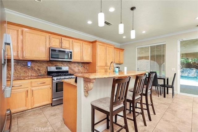 39423 Rowan Ct, Palmdale, CA 93551 - kitchen with stainless steel appliances, crown molding, decorative backsplash, recessed lighting, and light brown cabinets