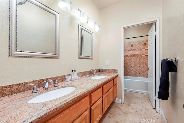 39423 Rowan Ct, Palmdale, CA 93551 - full bathroom with double vanity, tile patterned floors, and shower / tub combination