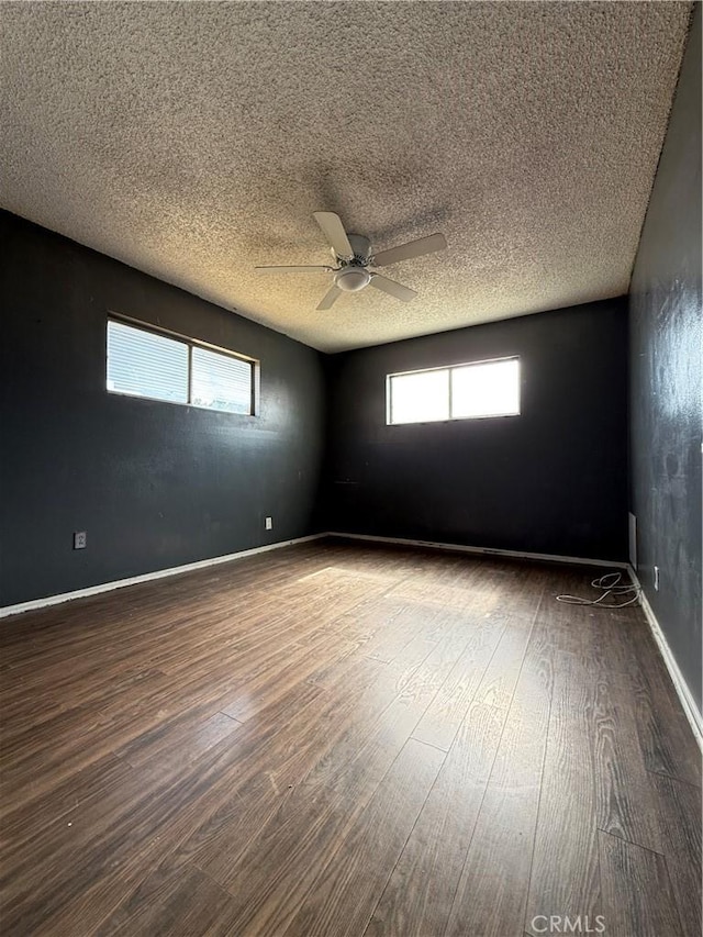 7560 El Escorial Way, Buena Park, CA 90620 - empty room with wood finished floors, a ceiling fan, and a textured ceiling