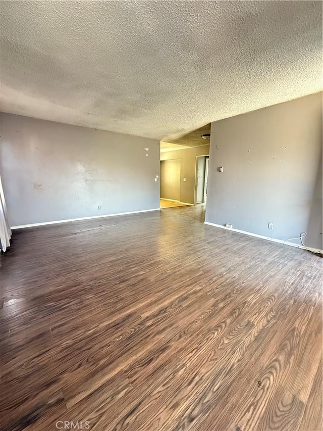 7560 El Escorial Way, Buena Park, CA 90620 - unfurnished room featuring a textured ceiling and wood finished floors