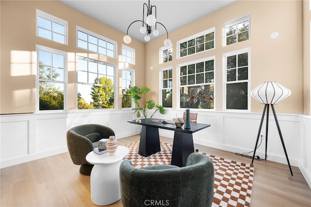 600 Baldwin Ct, Sierra Madre, CA 91024 - home office with a decorative wall, wood finished floors, and wainscoting