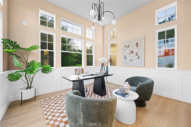 600 Baldwin Ct, Sierra Madre, CA 91024 - sitting room with wood finished floors, a wainscoted wall, a chandelier, a decorative wall, and a desk
