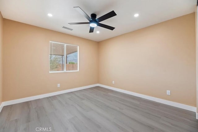66101 14th St, Desert Hot Springs, CA 92240 - unfurnished room with ceiling fan, wood finished floors, and recessed lighting