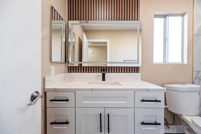 66101 14th St, Desert Hot Springs, CA 92240 - bathroom with vanity and healthy amount of natural light