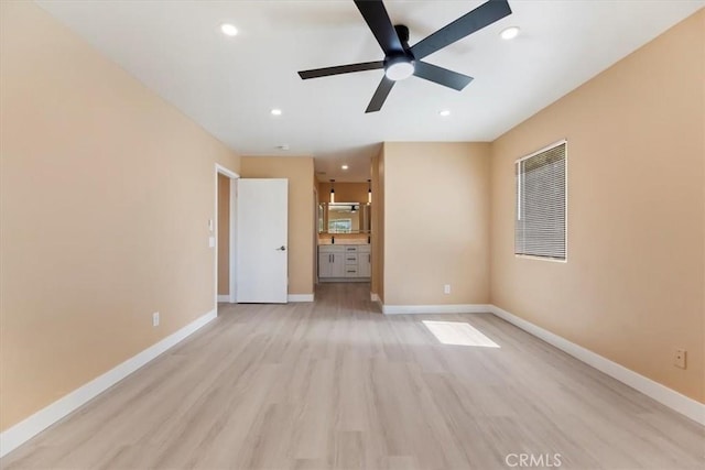 66101 14th St, Desert Hot Springs, CA 92240 - empty room with light wood-type flooring, ceiling fan, and recessed lighting