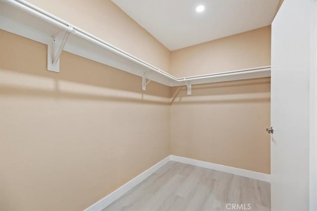 66101 14th St, Desert Hot Springs, CA 92240 - walk in closet with wood finished floors