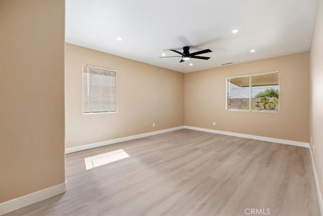66101 14th St, Desert Hot Springs, CA 92240 - spare room with ceiling fan, light wood finished floors, and recessed lighting