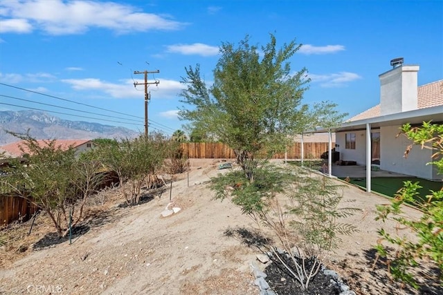 66101 14th St, Desert Hot Springs, CA 92240 - view of yard featuring a mountain view and a patio