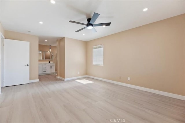 66101 14th St, Desert Hot Springs, CA 92240 - spare room featuring light wood finished floors, a ceiling fan, and recessed lighting