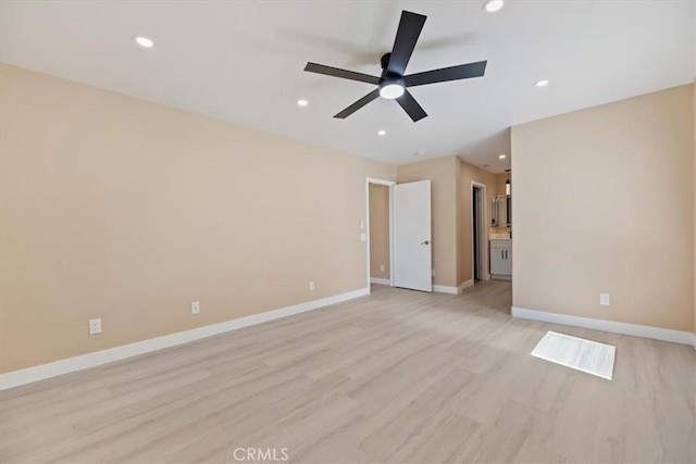 66101 14th St, Desert Hot Springs, CA 92240 - unfurnished bedroom with light wood-style floors, recessed lighting, connected bathroom, and ceiling fan
