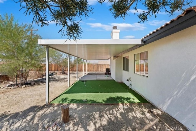 66101 14th St, Desert Hot Springs, CA 92240 - fenced backyard featuring a patio area