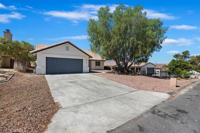 66101 14th St, Desert Hot Springs, CA 92240 - ranch-style home with an attached garage, driveway, and stucco siding