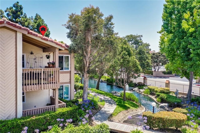 16521 Grunion Ln Unit 207, Huntington Beach, CA 92649 - view of community featuring a garden pond