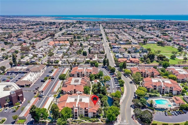 16521 Grunion Ln Unit 207, Huntington Beach, CA 92649 - aerial view of property's location with nearby suburban area and a large body of water