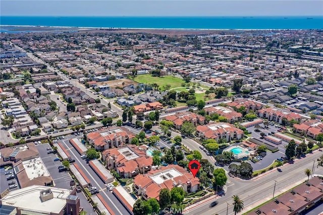 16521 Grunion Ln Unit 207, Huntington Beach, CA 92649 - aerial view of property and surrounding area with nearby suburban area