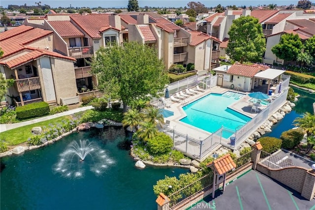 16521 Grunion Ln Unit 207, Huntington Beach, CA 92649 - aerial view of residential area featuring a pool area