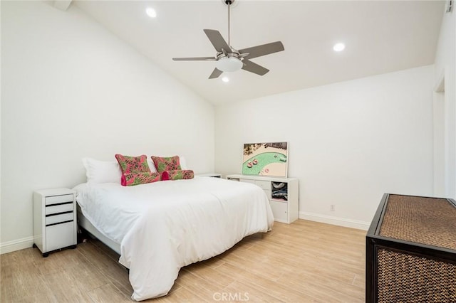16521 Grunion Ln Unit 207, Huntington Beach, CA 92649 - bedroom featuring lofted ceiling, light wood finished floors, recessed lighting, and a ceiling fan