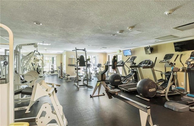 1199 Pacific Unit 1303, San Diego, CA 92101 - exercise room featuring a textured ceiling