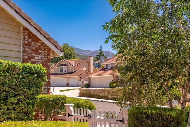 968 Saddlehorn Pl, Newbury Park, CA 91320 - fenced yard with a garage, driveway, and a mountain view