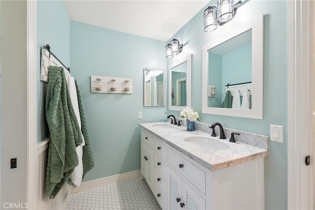 968 Saddlehorn Pl, Newbury Park, CA 91320 - bathroom with double vanity and baseboards