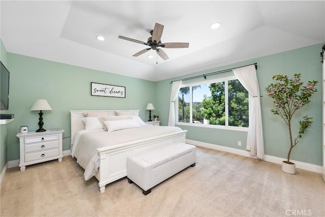 968 Saddlehorn Pl, Newbury Park, CA 91320 - bedroom featuring light colored carpet, recessed lighting, a tray ceiling, and ceiling fan