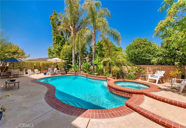 968 Saddlehorn Pl, Newbury Park, CA 91320 - view of pool featuring a patio, a fenced backyard, and a pool with connected hot tub