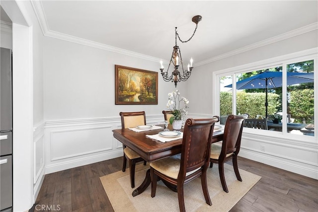 968 Saddlehorn Pl, Newbury Park, CA 91320 - dining room with a chandelier, crown molding, dark wood finished floors, and a wainscoted wall