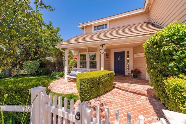 968 Saddlehorn Pl, Newbury Park, CA 91320 - view of front of property with covered porch and a tiled roof