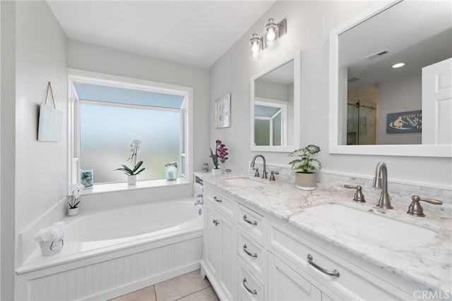 968 Saddlehorn Pl, Newbury Park, CA 91320 - bathroom featuring double vanity, a garden tub, tile patterned floors, and a shower with shower door