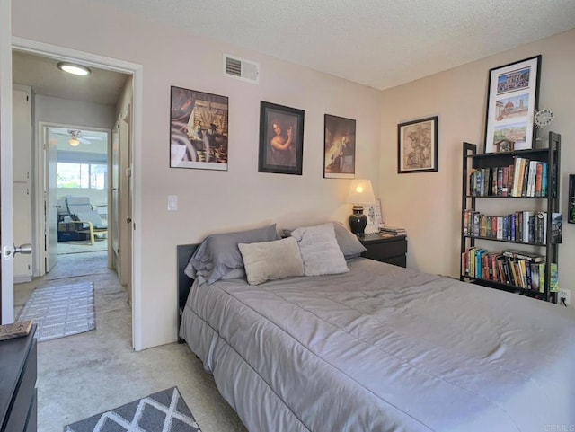 12553 Mapleview St Unit 28, Lakeside, CA 92040 - bedroom with light colored carpet and a textured ceiling