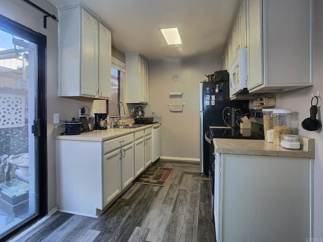 12553 Mapleview St Unit 28, Lakeside, CA 92040 - kitchen featuring white appliances, dark wood-style floors, and light countertops