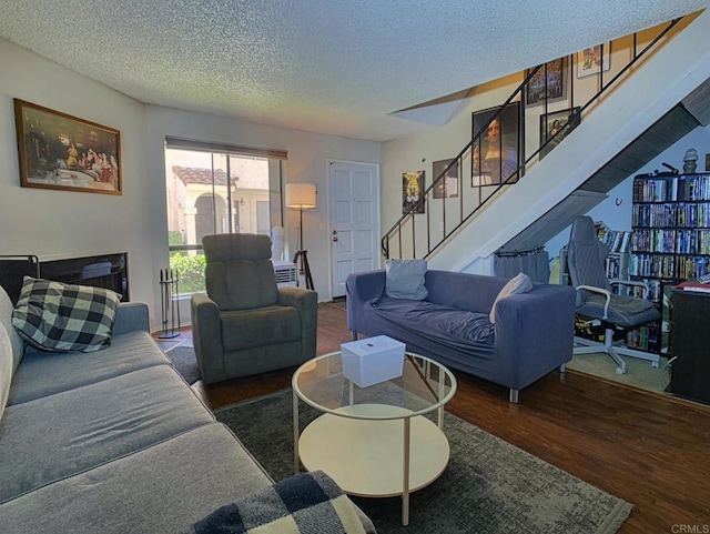 12553 Mapleview St Unit 28, Lakeside, CA 92040 - living room featuring wood finished floors, stairs, and a textured ceiling