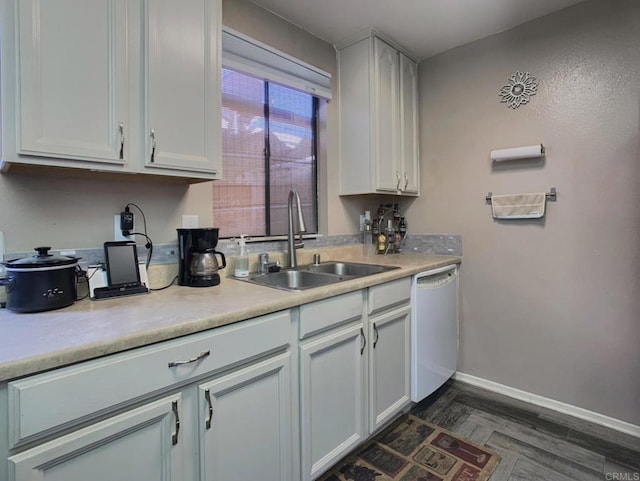 12553 Mapleview St Unit 28, Lakeside, CA 92040 - kitchen featuring dishwasher, light countertops, and white cabinetry
