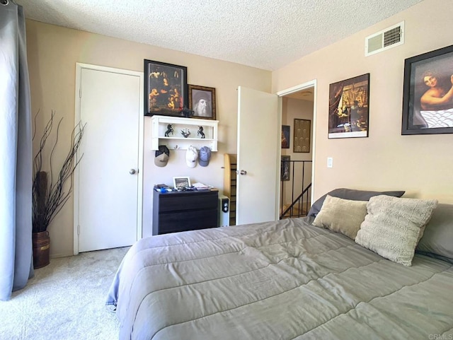 12553 Mapleview St Unit 28, Lakeside, CA 92040 - carpeted bedroom featuring a textured ceiling