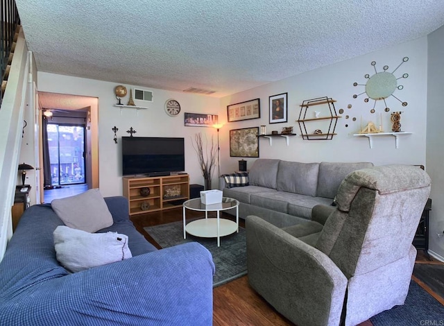 12553 Mapleview St Unit 28, Lakeside, CA 92040 - living room featuring wood finished floors and a textured ceiling