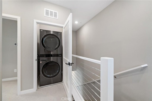 2890 Via Alta Pl, San Diego, CA 92108 - laundry area with stacked washer / drying machine, carpet flooring, and recessed lighting